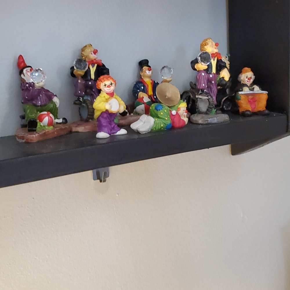 Set of 8 ceremic clowns